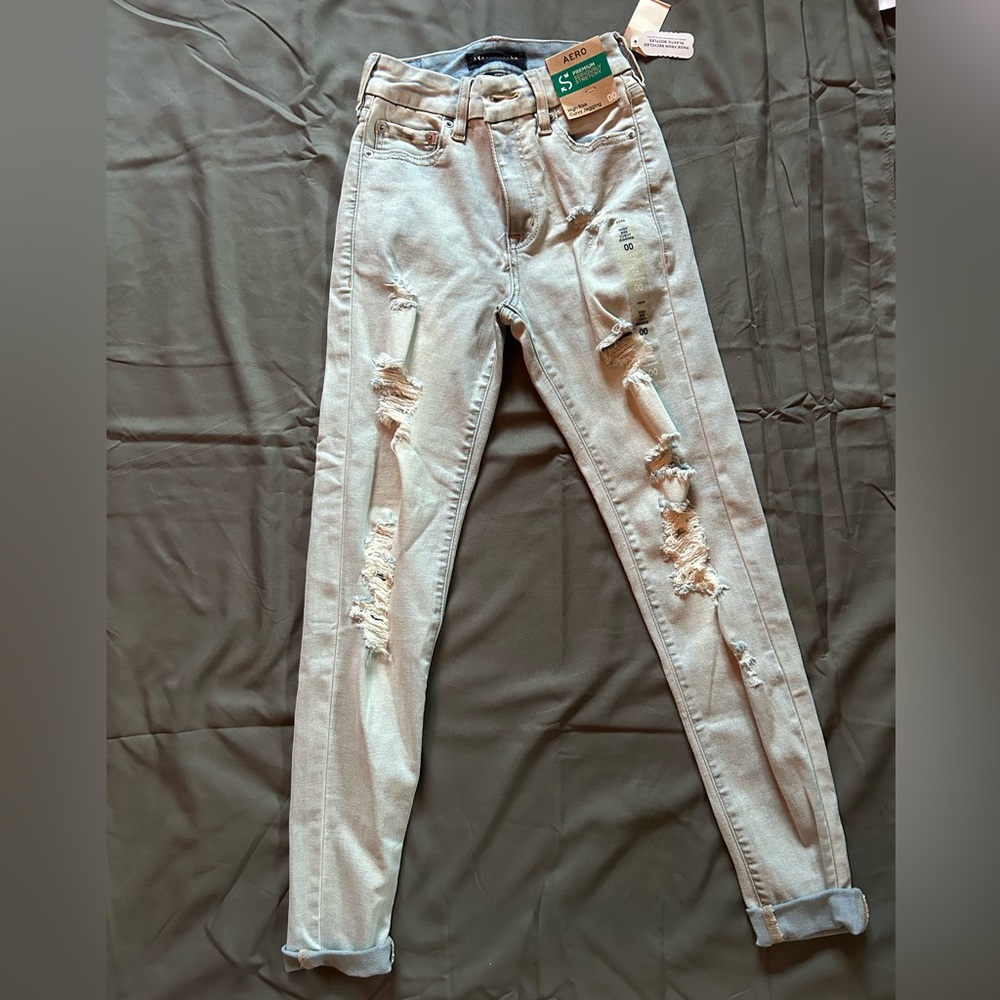 Light blue ripped skinny jeans